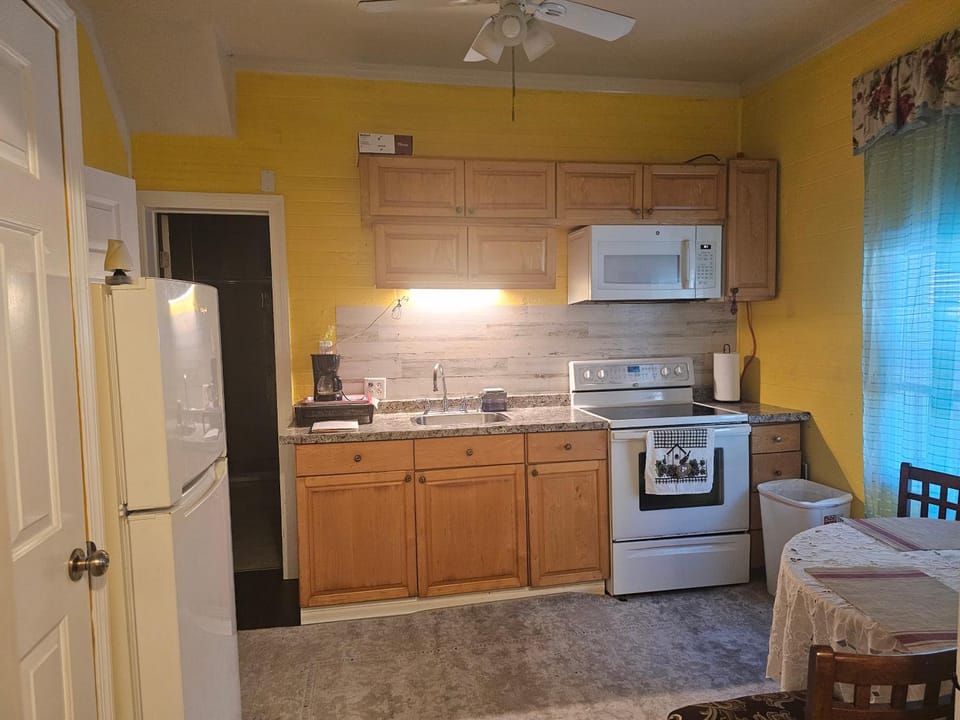 Kitchen or kitchenette, oven, stove, toaster