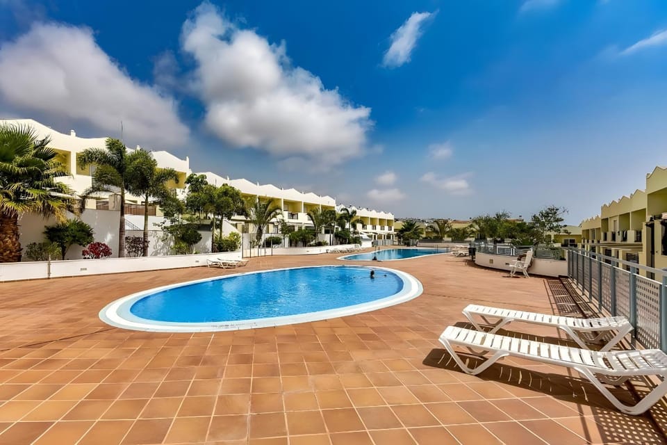 Property building, Living room, Swimming pool