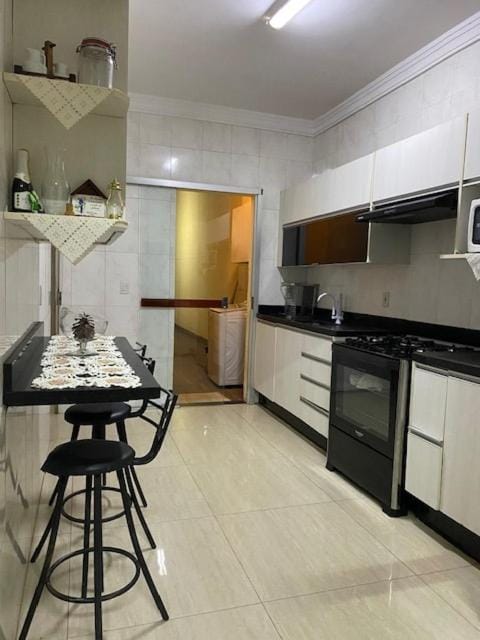 Casa espaçosa com área gourmet e churrasqueira Apartment in Goiania