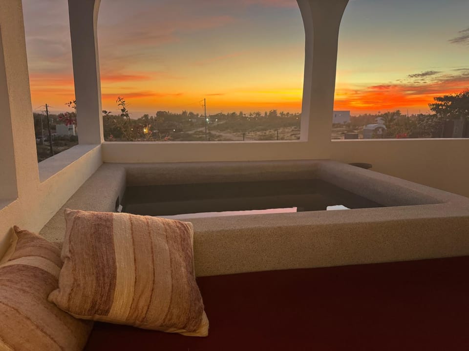 View (from property/room), Balcony/Terrace, Seating area, Swimming pool, Sunset