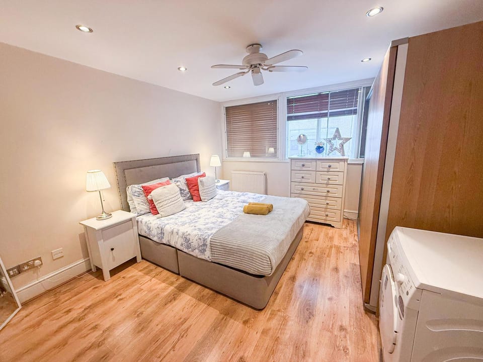 Bed, Photo of the whole room, Decorative detail, Bedroom, storage, towels, wardrobe