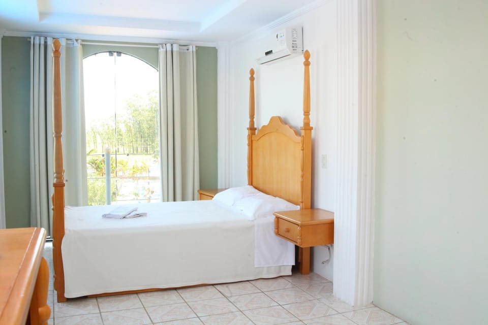 Bed, Photo of the whole room, Bedroom, towels, air conditioner