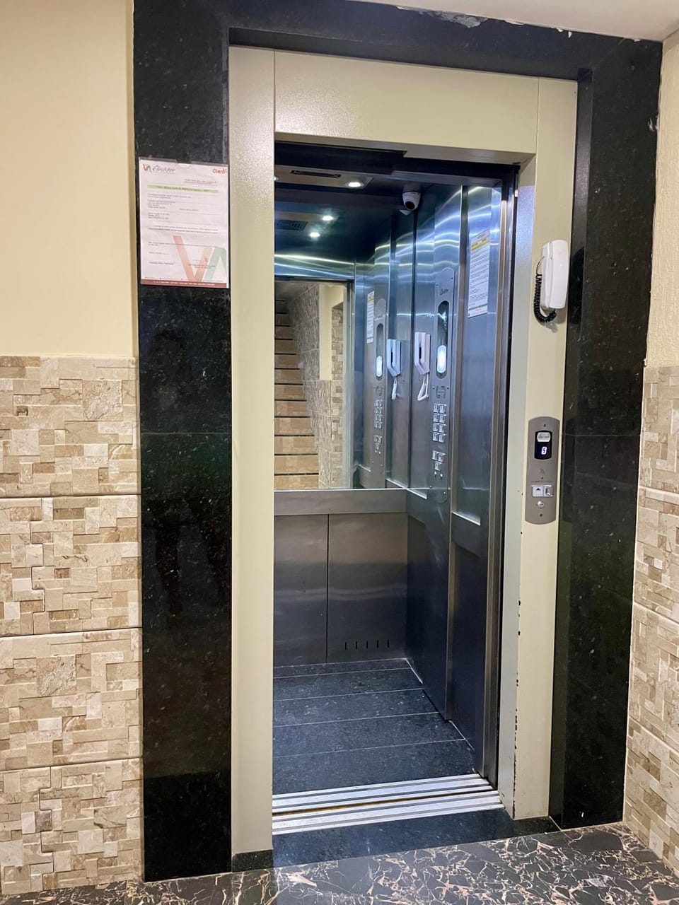 Property building, elevator