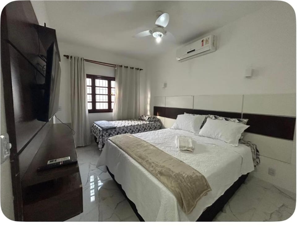 Bed, TV and multimedia, Bedroom, towels, air conditioner