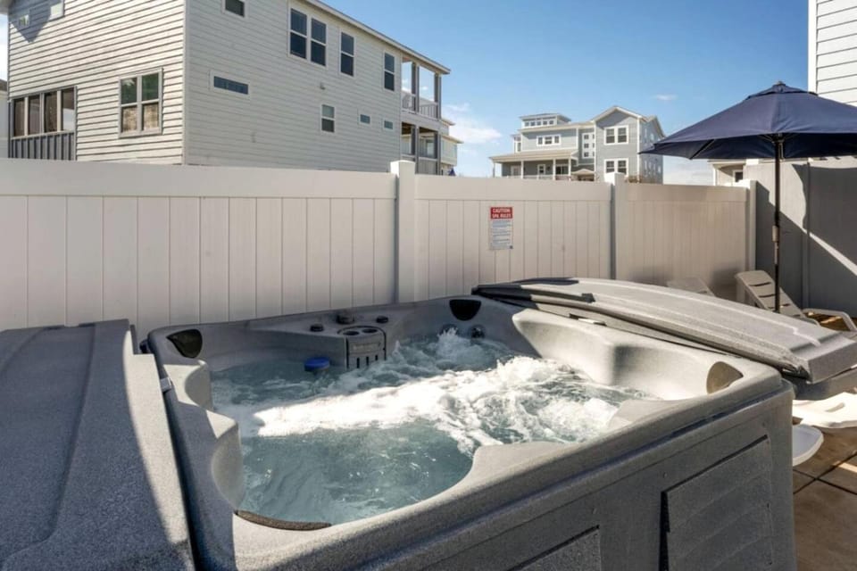 Luxury Coastal Escape with Private Pool, BBQ Grill & Family Amenities in Corolla, North Carolina House in Corolla