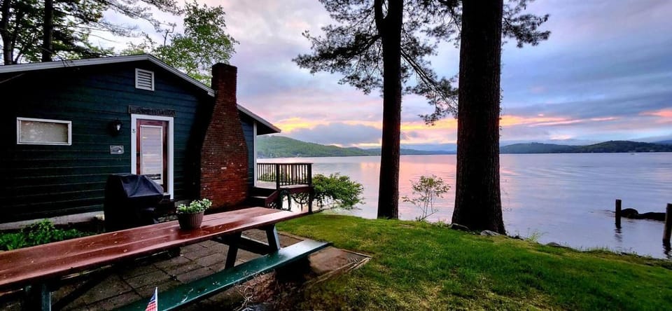 Scenic Lakeside Cabin with Exclusive Boat Dock Near Weirs Beach, Laconia, New Hampshire Cabin in Laconia