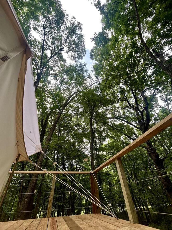 Enchanted Woodland Glamping Tent with Fire Pit & Clubhouse Kitchen Access Near Gentry, Arkansas House in Arkansas
