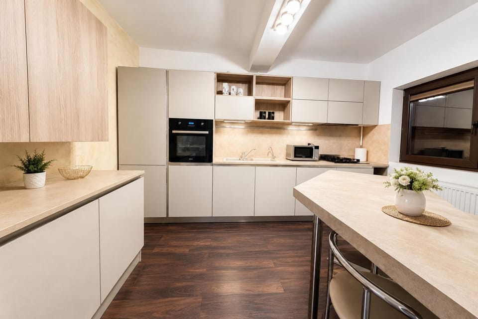 Kitchen or kitchenette, dishwasher, oven, stove