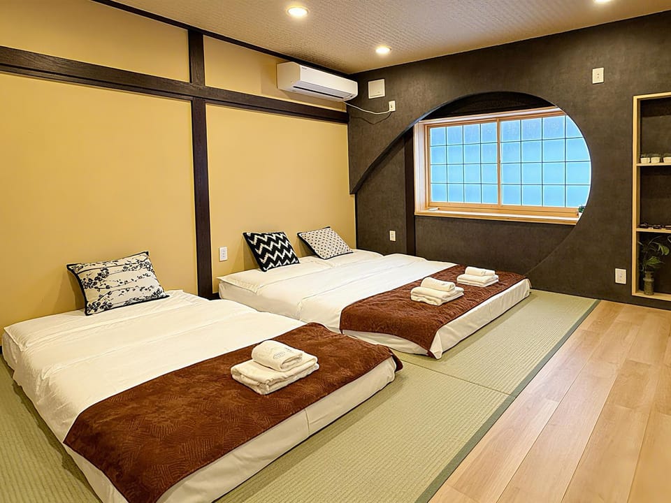 Bed, Photo of the whole room, Bedroom, towels, air conditioner