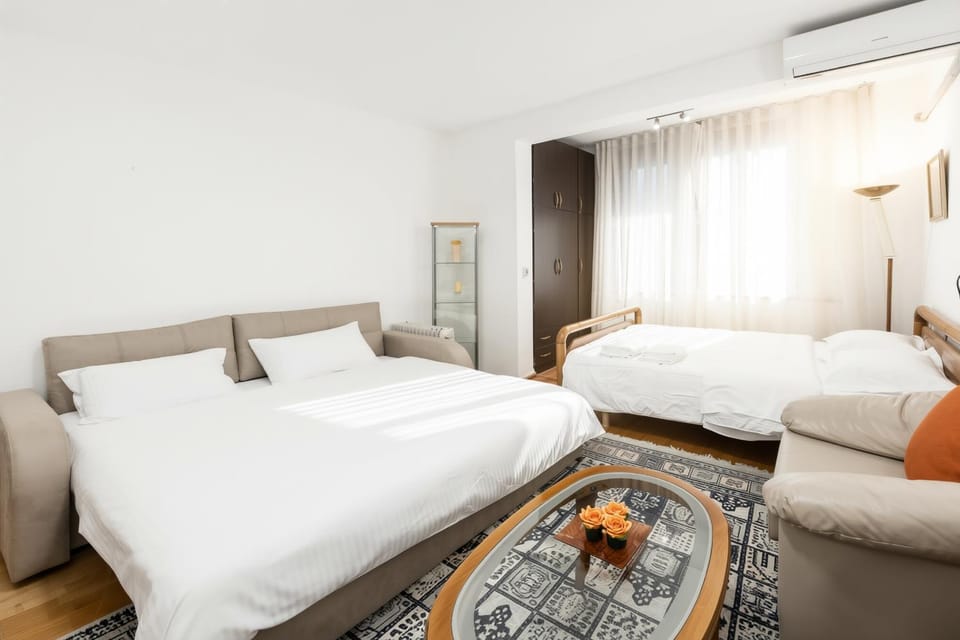 Bed, Photo of the whole room, Bedroom, towels, air conditioner