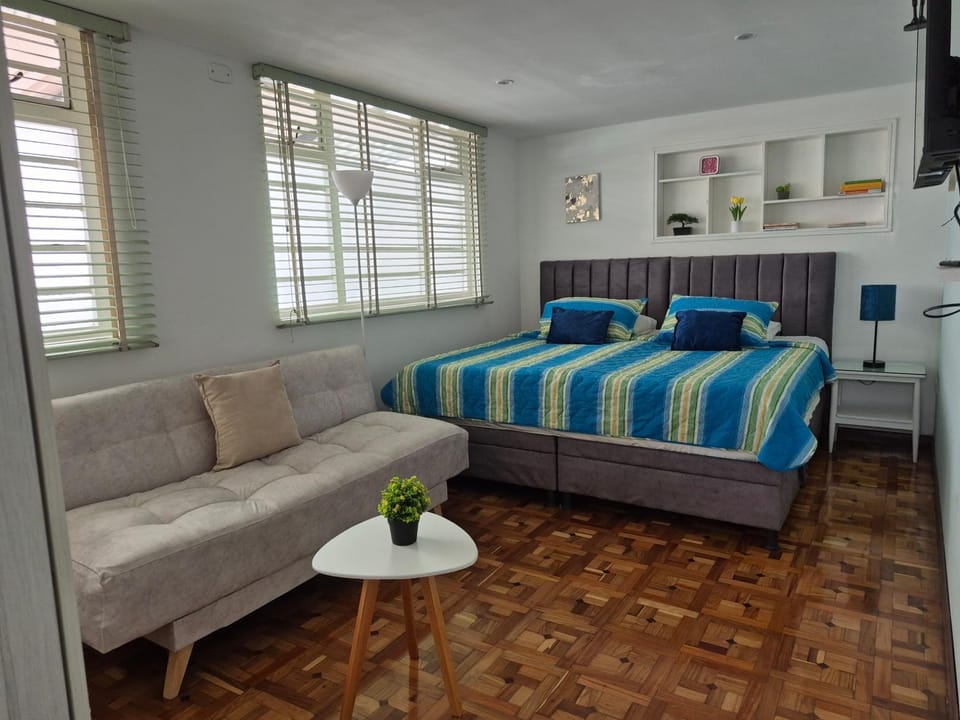 Bed, Seating area, Bedroom