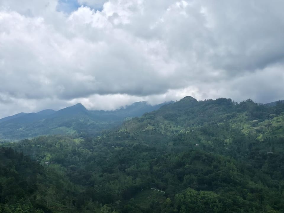 Property building, Nearby landmark, Natural landscape, Mountain view