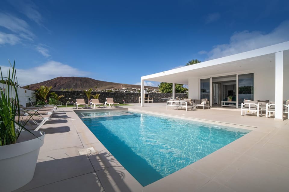 Property building, Living room, Swimming pool