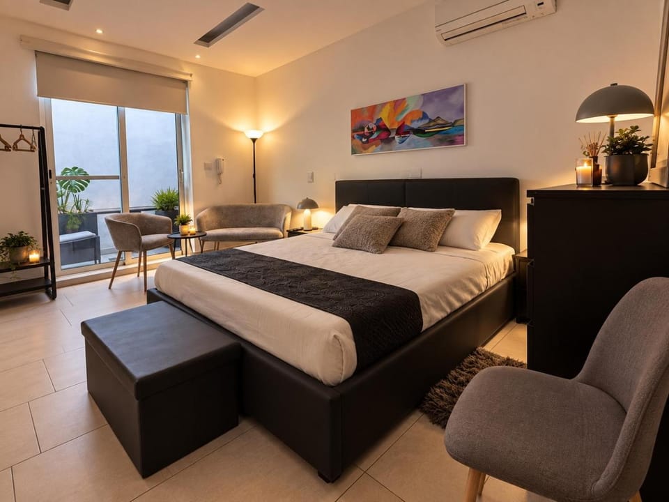 Bed, Living room, Seating area, Bedroom