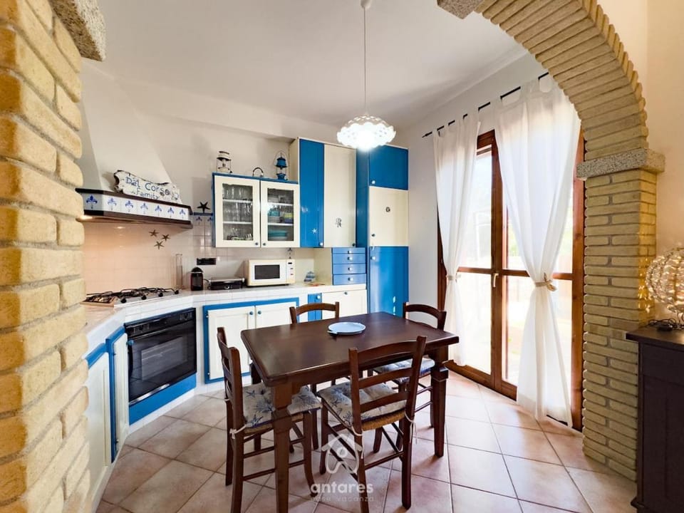 Dining area, microwave, oven, stove