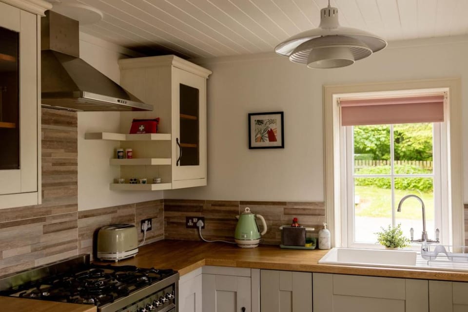 Kitchen or kitchenette, stove, toaster