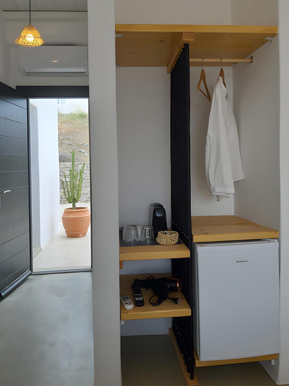 Inner courtyard view, furniture, minibar, wardrobe