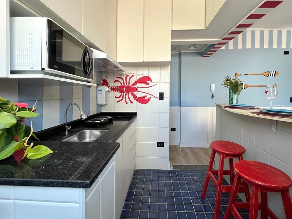 Kitchen or kitchenette, microwave, stove
