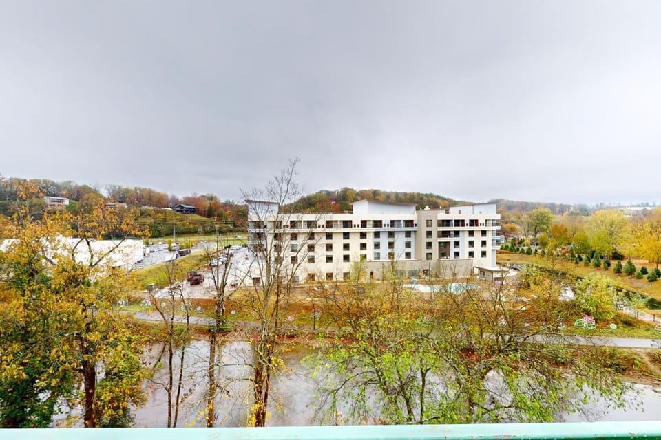 Riverfront Condo Sleeps 6 Shared Pool Fireplace House in Pigeon Forge