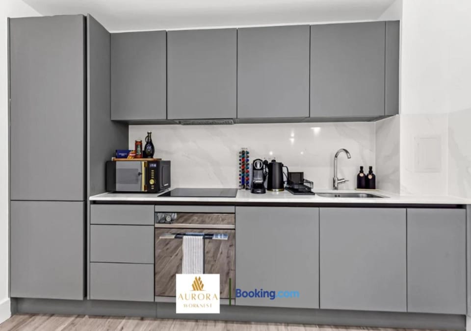 Kitchen or kitchenette, dishwasher, oven, stove