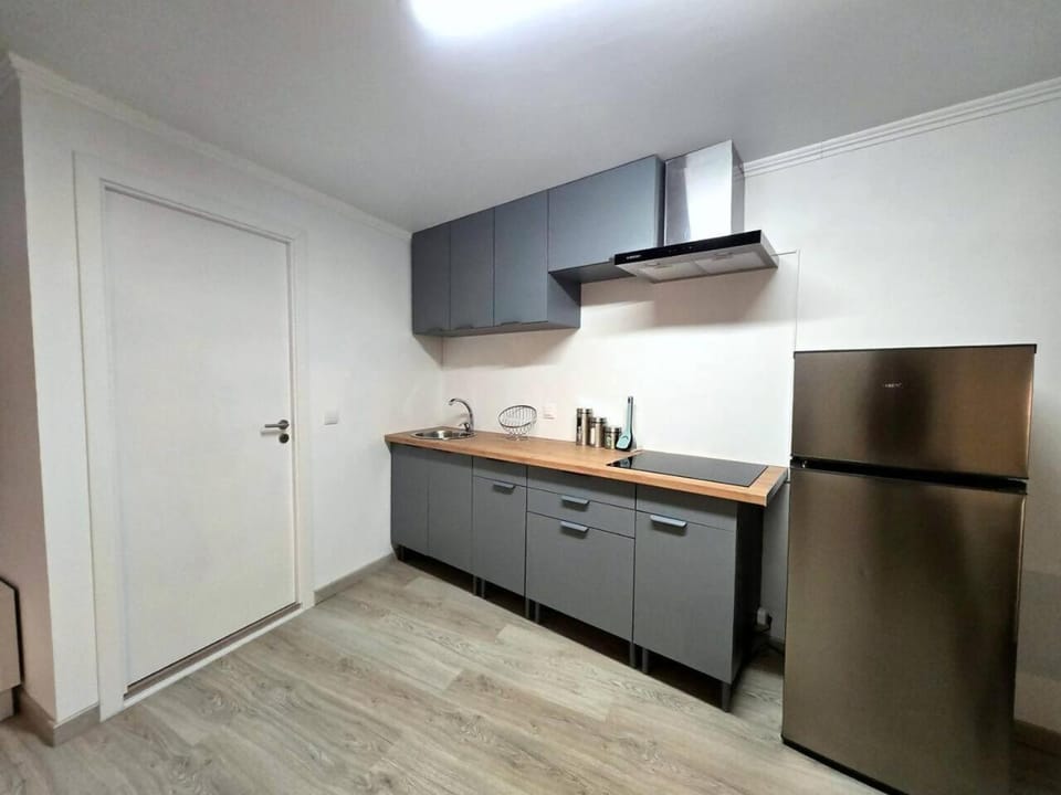 Kitchen or kitchenette, stove