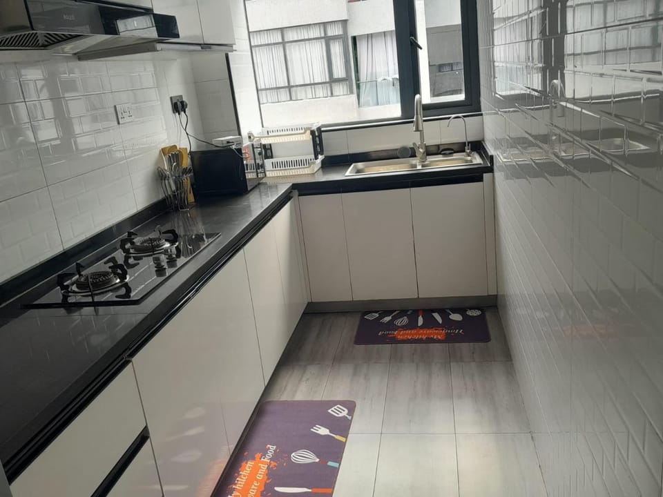 modernly furnished two bedroom apartment with swimming pool ,children playground ,ample private parking space and amazing scenic views Apartment in Nairobi