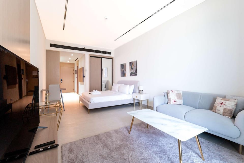 Free housekeeping visits during your stay - StayShort - Amazing Studio in JVC that Sleeps 2 with Balcony Apartment in Dubai