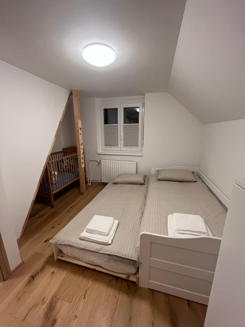 Bed, cot, towels