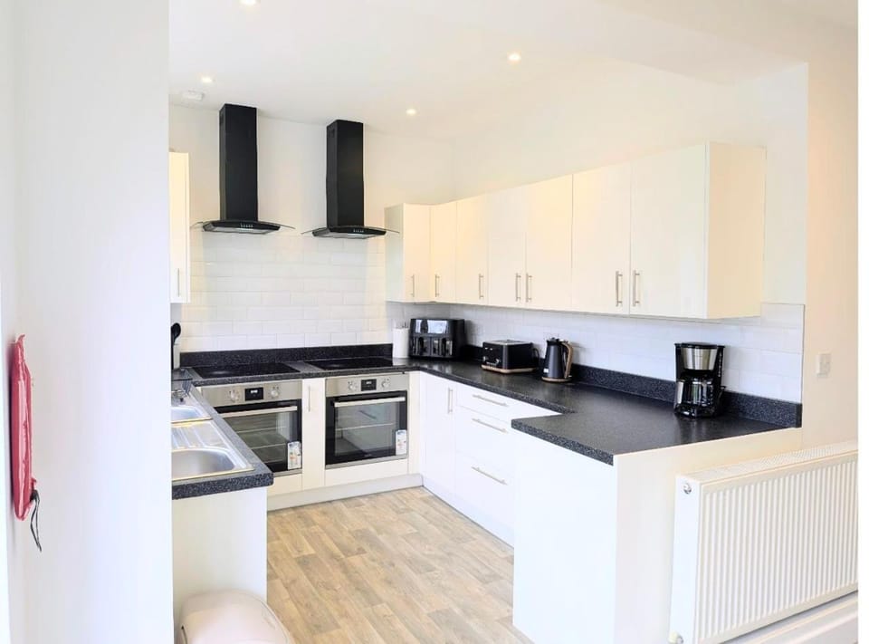 Kitchen or kitchenette, stove, toaster