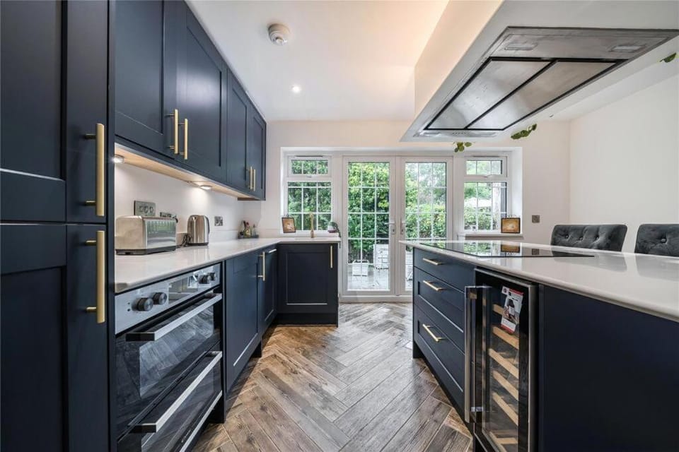 Kitchen or kitchenette, oven, stove, toaster