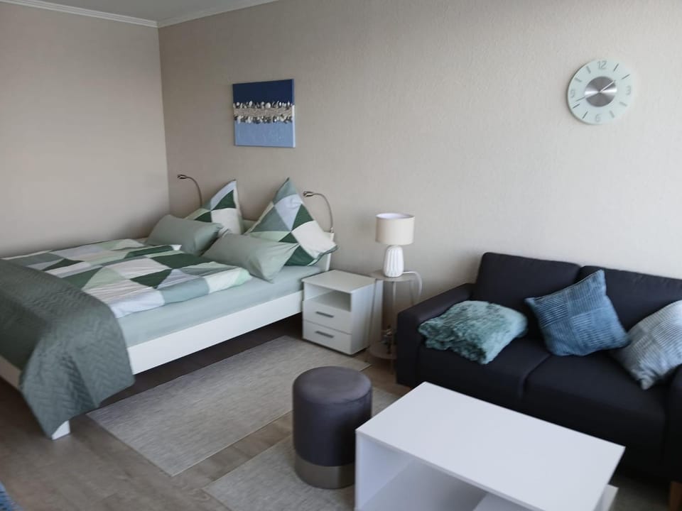 Bed, Living room, Seating area