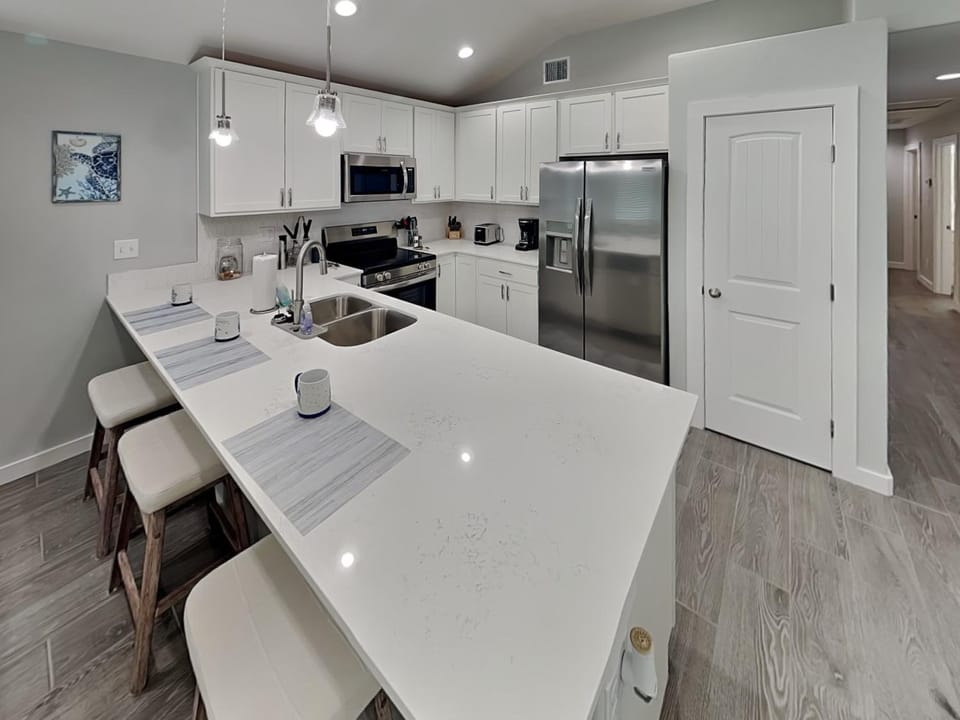 Kitchen or kitchenette, Seating area, furniture, microwave, stove