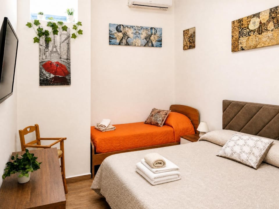 Photo of the whole room, Bedroom, towels, air conditioner