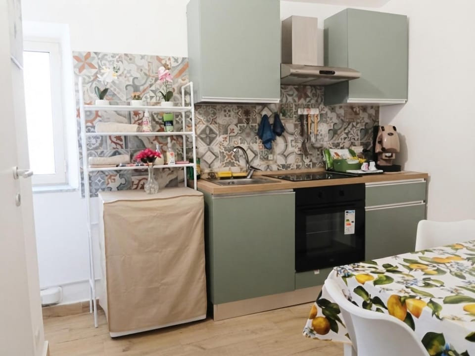 Kitchen or kitchenette, oven, stove