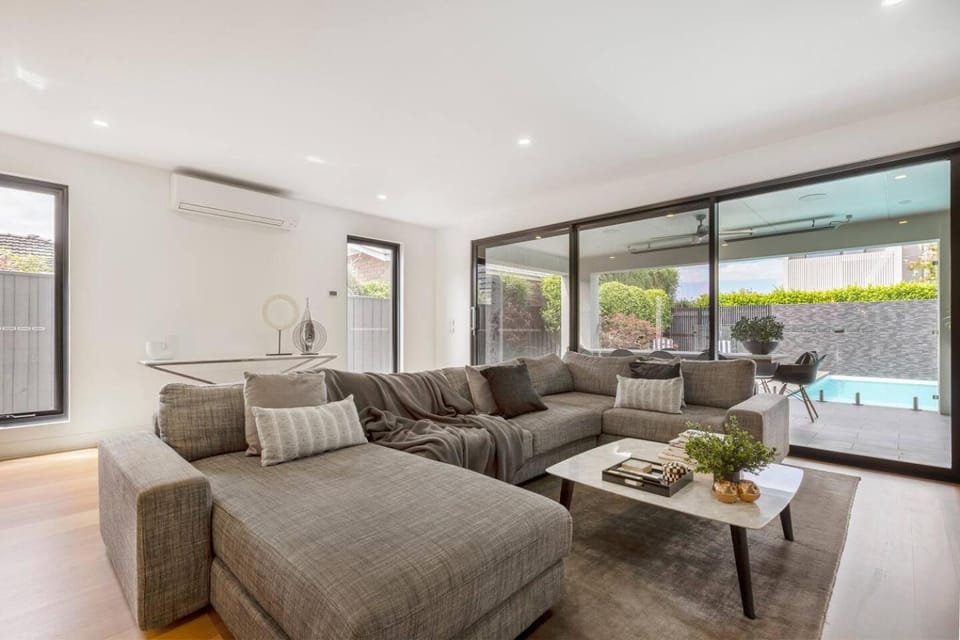 Living room, Seating area, Pool view