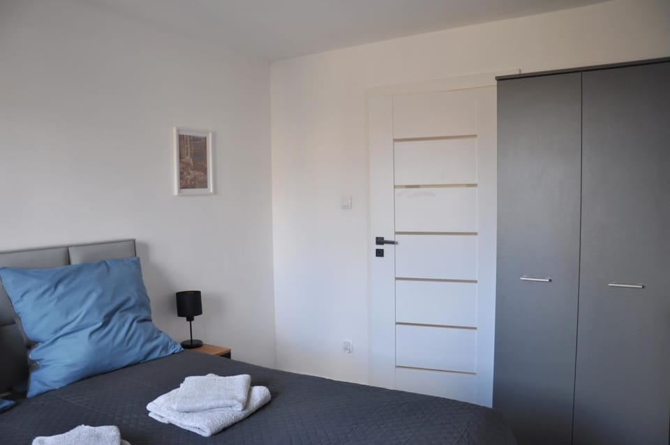 Bed, wardrobe