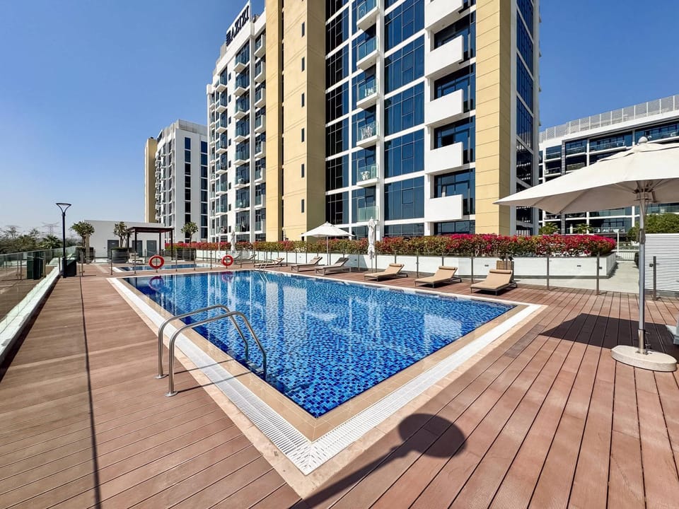 Property building, Day, Pool view, sunbed