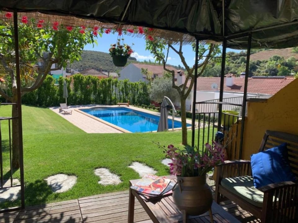 Property building, Living room, Swimming pool