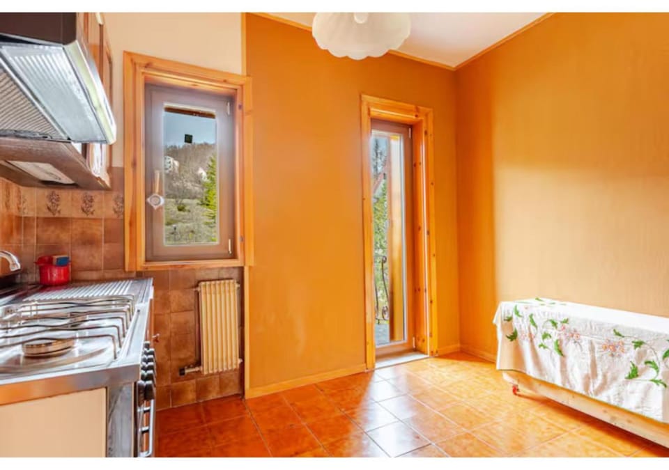 Kitchen or kitchenette, Living room, Seating area, stove