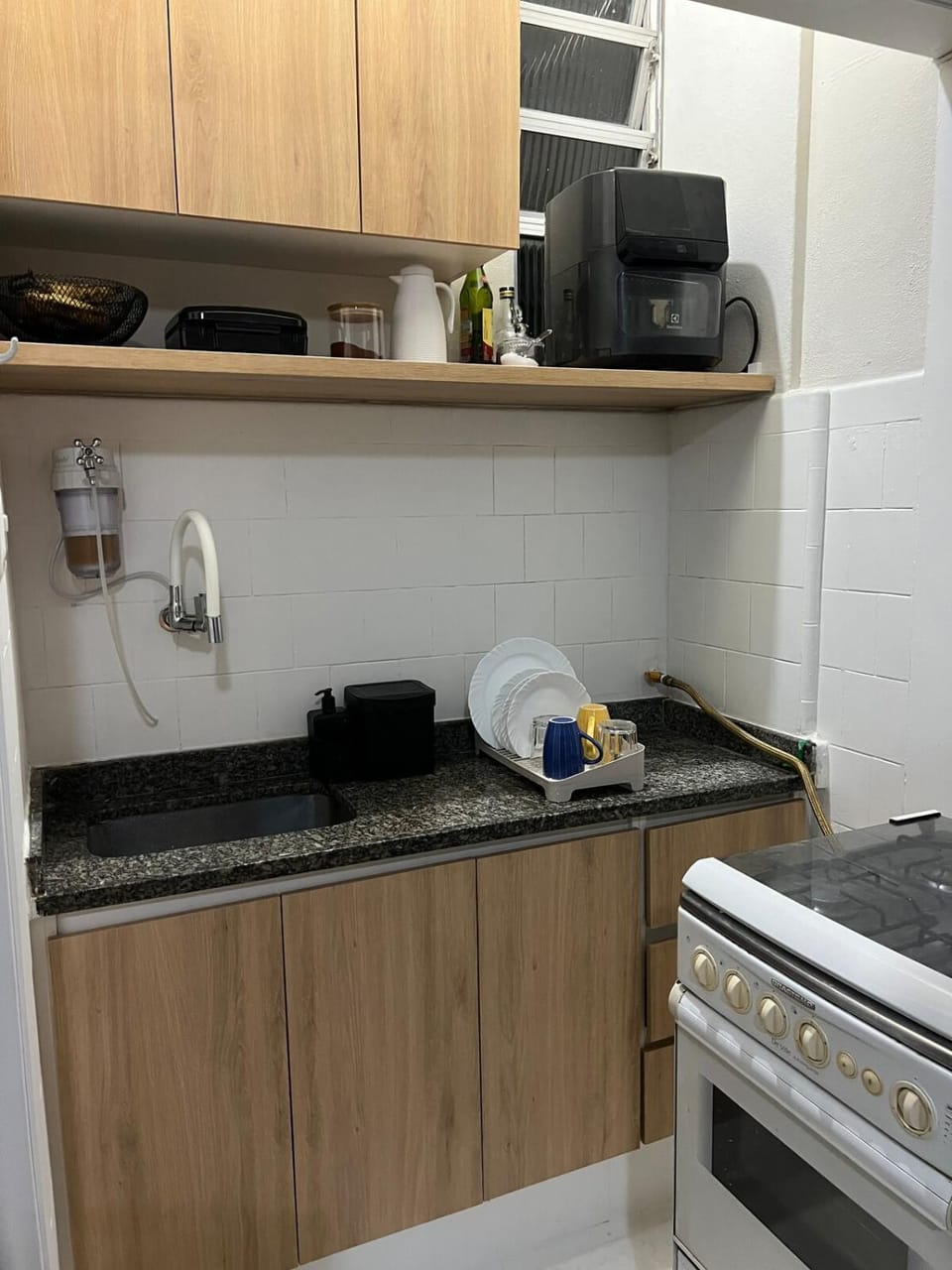 Kitchen or kitchenette, stove, toaster