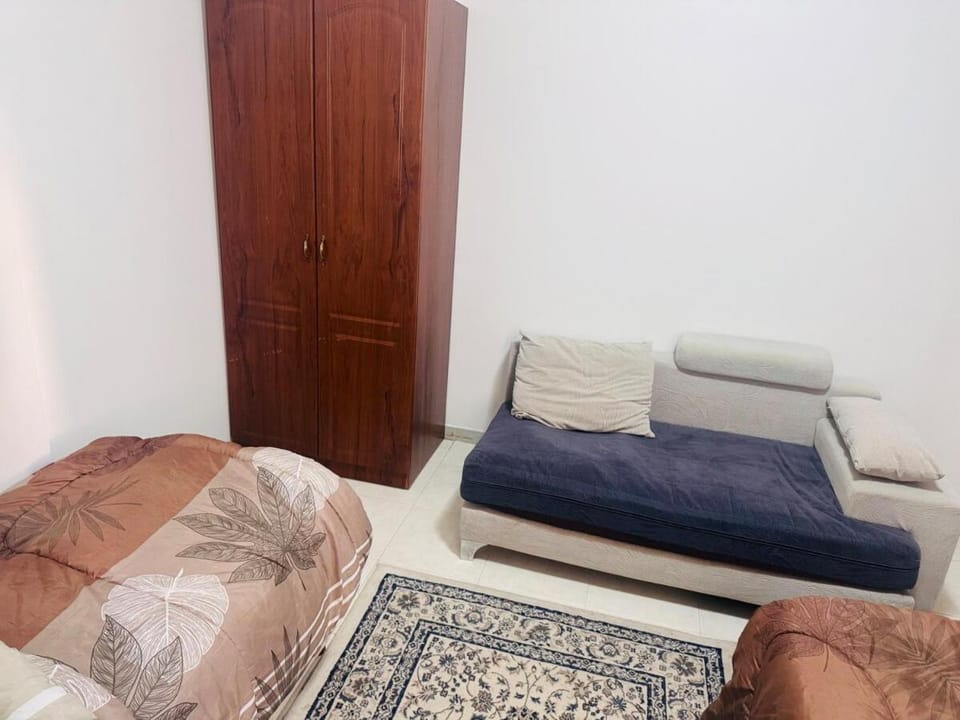 Double Room shared bathroom Apartment in Al Sharjah