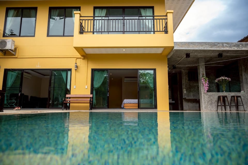 Property building, Patio, Day, Pool view, Swimming pool