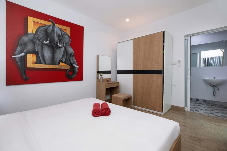 Bed, Bathroom, Decorative detail, Bedroom, hair dresser, towels, wardrobe