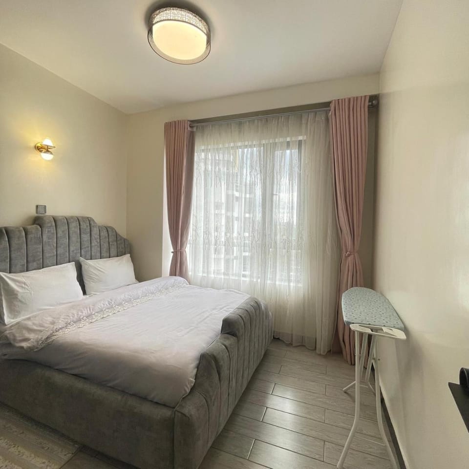 classy executive two bedroom apartment with fully equipped gym ample parking space swimming pool children playing ground and amazing scenic views Apartment in Nairobi