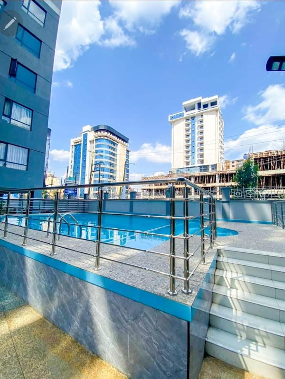 classy executive two bedroom apartment with fully equipped gym ample parking space swimming pool children playing ground and amazing scenic views Apartment in Nairobi