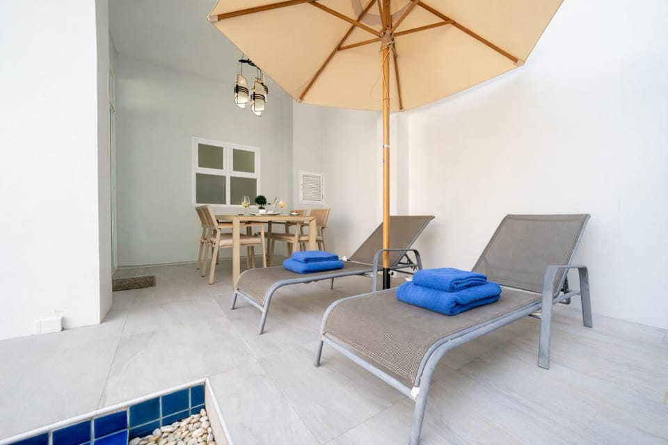 Patio, Seating area, Dining area, Pool view, sunbed