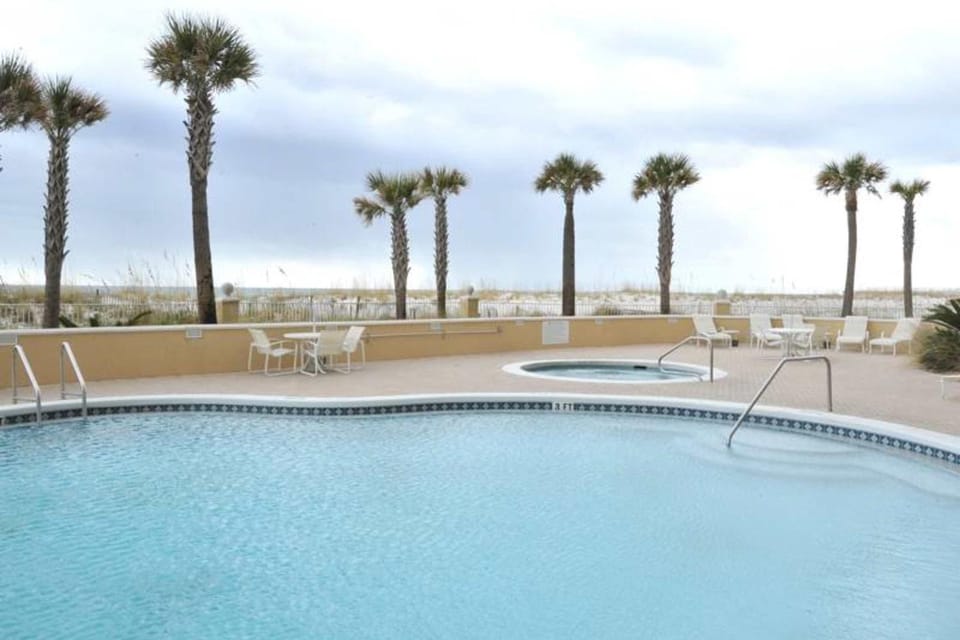 Condo with Partial Gulf View Onsite Pools Fitness Center Dry Sauna House in Pensacola Beach