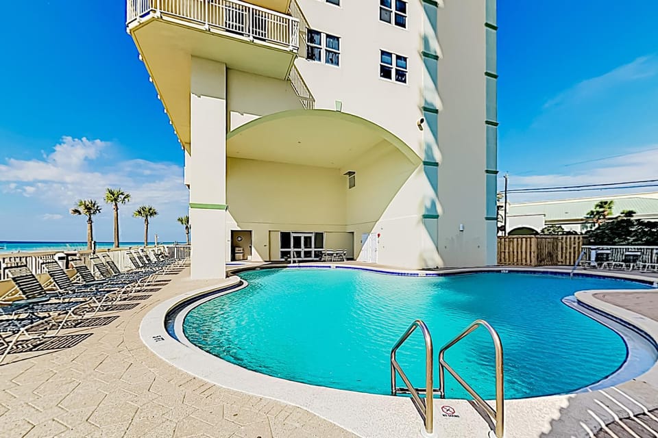 Eclectic gulf front condo with free WiFI two pools hot tub & easy beach access House in Panama City Beach