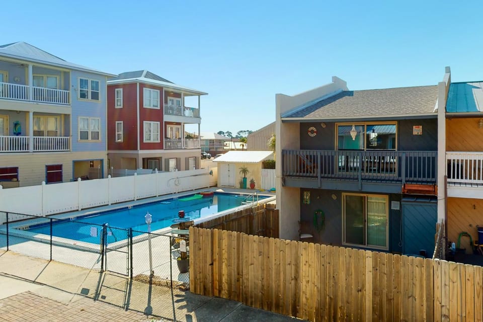Dog-friendly condo with pool balcony beach access central AC & W&D House in Lower Grand Lagoon