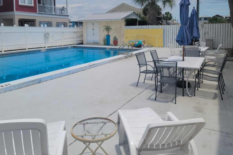 Dog-friendly condo with pool balcony beach access central AC & W&D House in Lower Grand Lagoon
